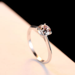 Four-Prong Solitaire Round Cut 0.8ct CZ Diamond Engagement Ring In Sterling Silver